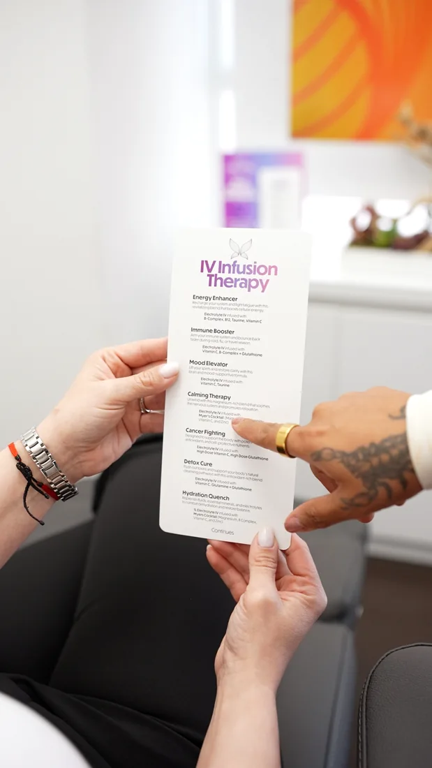 A patient reviewing VIKARA’s infusion therapy menu