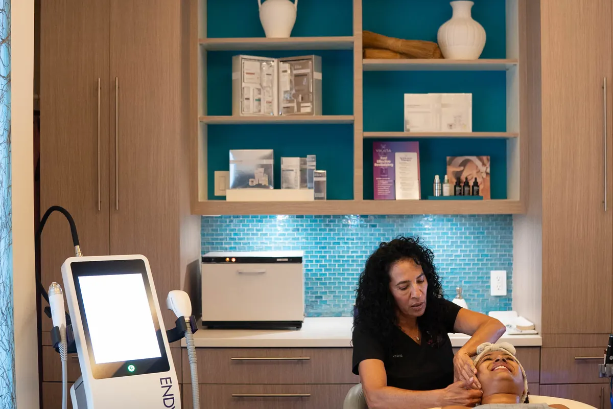 A VIKARA esthetics treatment room set up for an appointment
