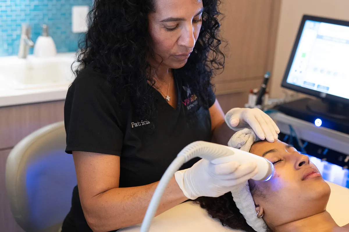 A VIKARA esthetician working across the mid face