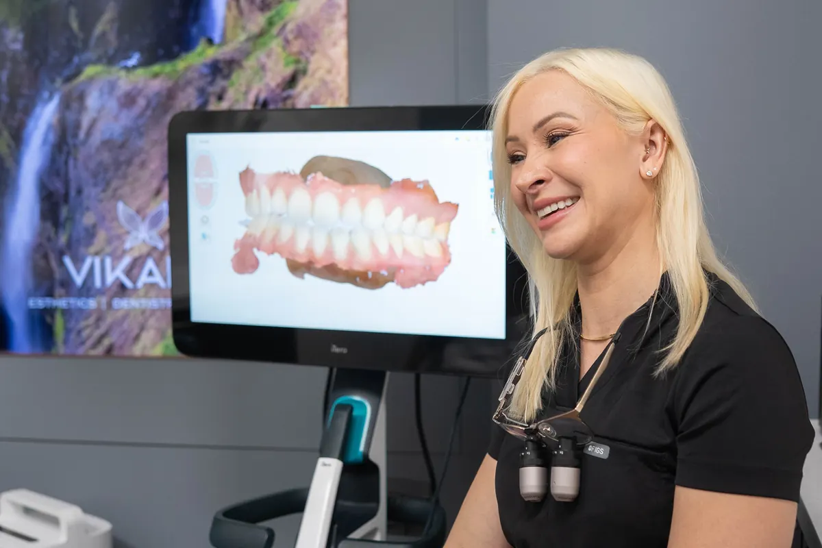 A VIKARA clinician reviewing a digital scan on the chairside monitor
