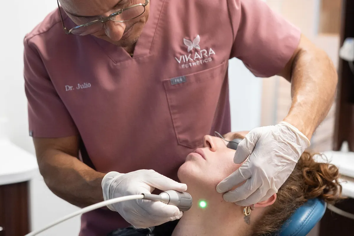 Dr. Julio Hernandez using a laser handpiece at VIKARA