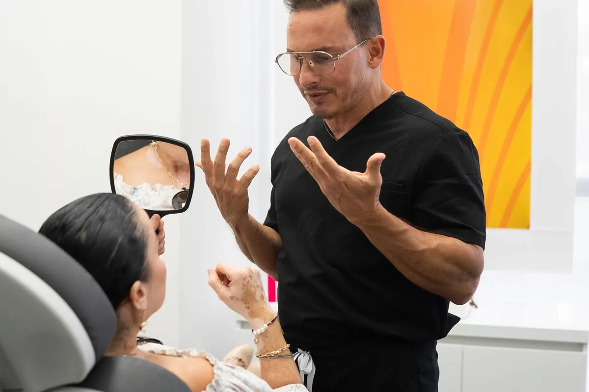 Dr. Julio Hernandez talking a patient through her options