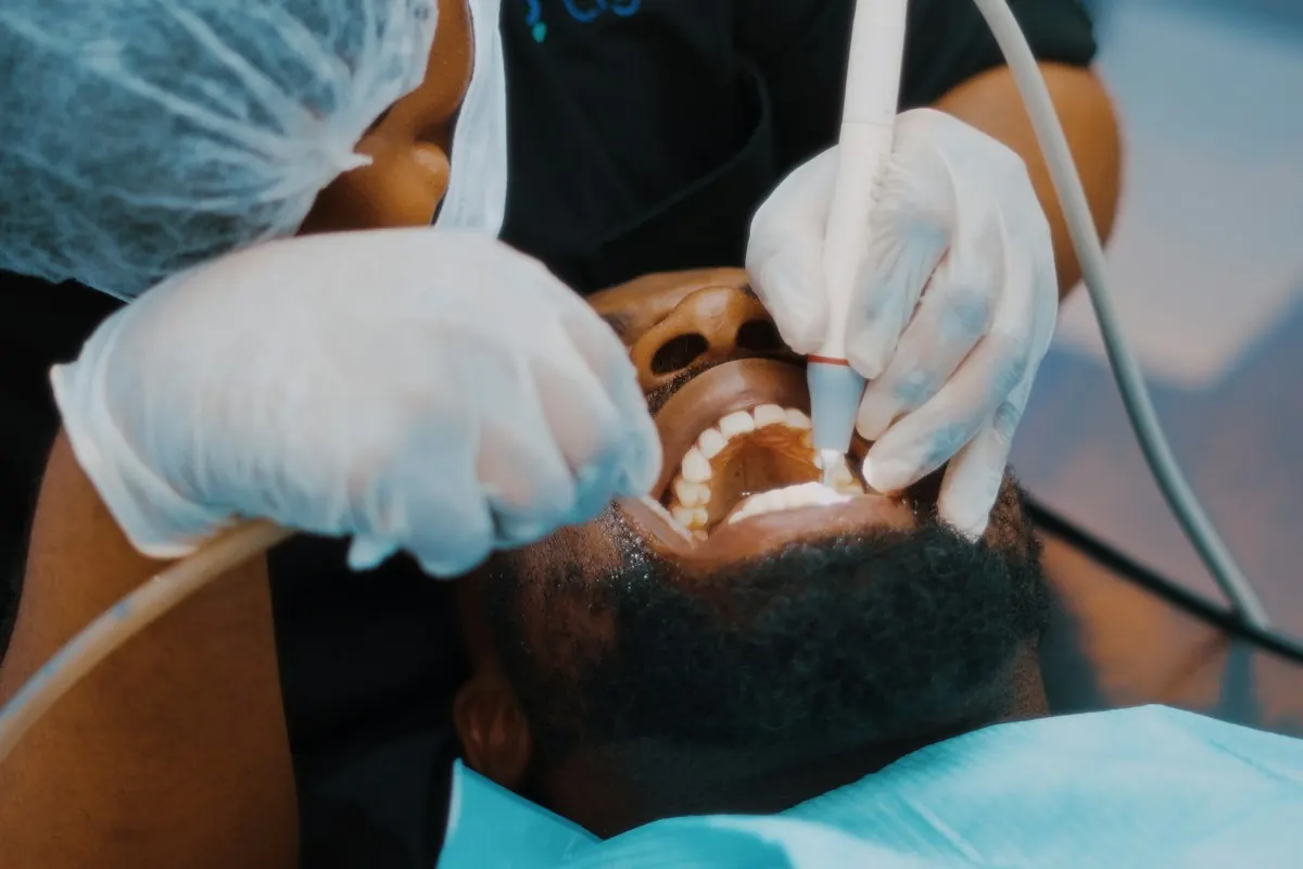 A periodontal procedure underway in the operatory
