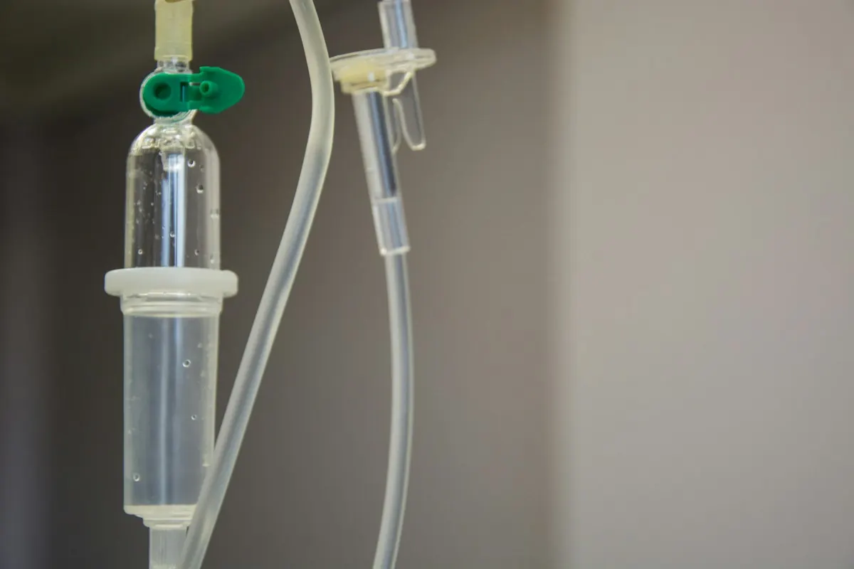 An infusion drip chamber in soft light