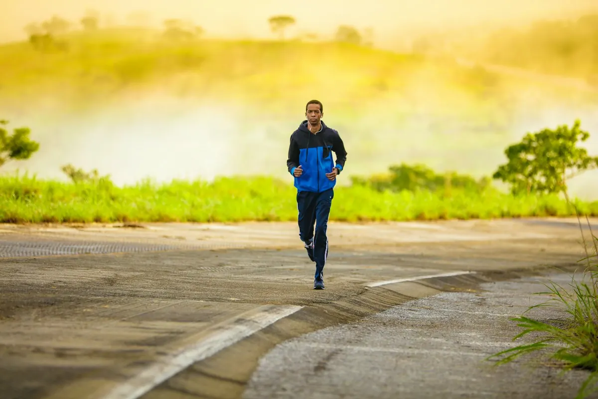 A runner on the road at first light