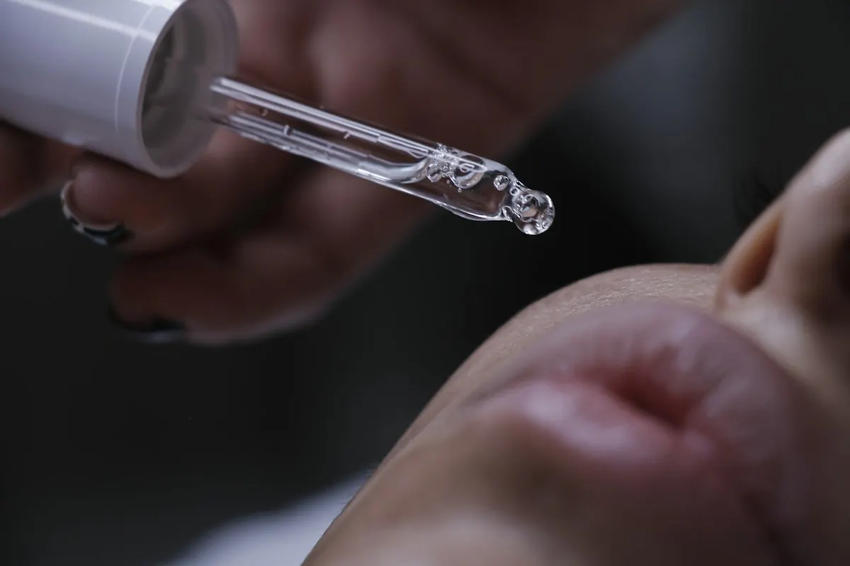 A fine dropper delivering treatment at the skin's surface